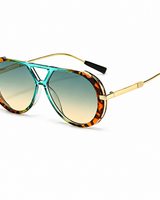 Damen Sonnenbrille mit runden Gläsern und schlanken Bügeln in Türkisblau