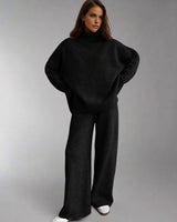 Damen Strick-Set mit Rollkragenpullover und weiter Hose in Schwarz