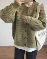Damen Strickjacke mit Rundhalsausschnitt Knopfverschluss Ballonärmeln und Strukturmuster in Grün