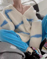 Damen-strickjacke mit v-ausschnitt knopfverschluss und streifen in Blau