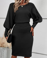 Damen strickkleid mit rundhalsausschnitt ballonärmeln und midilänge in Schwarz
