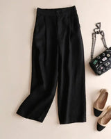 Damenhose mit hohem Bund, weitem Bein, Frontfalten und Seitentaschen in Schwarz