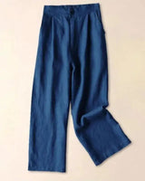 Damenhose mit hohem Bund, weitem Bein, Frontfalten und Seitentaschen in Marineblau