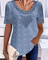Rickea - Elegante Kurzarmbluse in Blau
