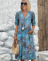 Dorina | V-Ausschnitt-Kleid mit Print in Ozeanblau