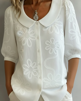 Blerta – Bluse Mit Blumen Muster Und Natürlicher Eleganz in Weiß