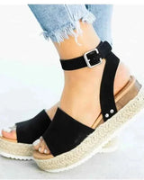 Elin – Plateau-Sandalen mit geflochtener Bastsohle und Knöchelriemen in Schwarz