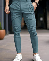 Alexey - Lässige Schlanke Passform Hose Mit Bundfalten Und Schräg Eingesetzten Taschen in Blau