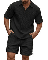 Herren-Set aus Poloshirt mit Viertelreißverschluss und Shorts mit Gitterstruktur in Schwarz