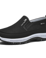 Herren Slipper mit Mesh-Oberfläche und Panelstruktur in Schwarz