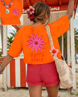 Zorina - Oversize-T-Shirt mit floralem Grafikdesign und Soft-Touch in Orange
