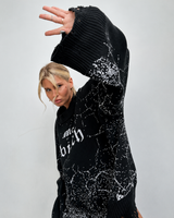 Oversize-Pullover für Damen mit grafischem Print und Zerrissen-Effekt – Liora in Schwarz