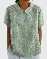 Kurzärmelige Damenbluse mit Blumenmuster und Bubikragen in Salbeigrün 2