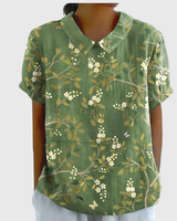 Kurzärmelige Damenbluse mit Blumenmuster und Bubikragen in Grün