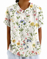 Kurzärmelige Damenbluse mit Blumenmuster und Bubikragen in Weiß