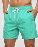 Kurze Herren-Badeshorts mit Kontrastbund in Grass Green