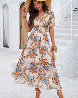 Liliana – Boho Maxikleid mit Blumenprint, V-Ausschnitt & Smoktaille in Aprikose