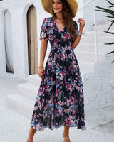 Liliana – Boho Maxikleid mit Blumenprint, V-Ausschnitt & Smoktaille in Schwarz