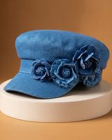 Nelisha – Jeanskappe Mit Blumenmuster in Blau