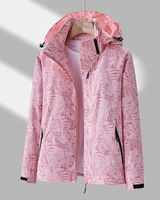 Miriam | Damen Wasserdichte Regenjacke mit Kapuze, Langer Schnitt und Muster Optik in Rosa