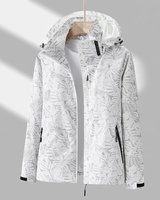 Miriam | Damen Wasserdichte Regenjacke mit Kapuze, Langer Schnitt und Muster Optik in Grau