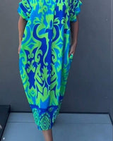 Nia | Damen Midikleid Blumenmuster V-Ausschnitt Feminin in Grün