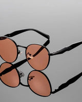 Sonnenbrille rund UV400 mit Metallbügeln in Koralle