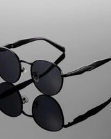 Sonnenbrille rund UV400 mit Metallbügeln in Schwarz