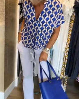 Naskia – Kurzärmelige Bluse Mit V-Ausschnitt in Blau