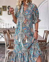 Aniy – Sommerkleid mit Blumenmuster und V-Ausschnitt in Blau