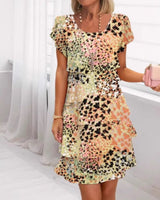 Jonna - Stilvolles Kleid Mit Leopard Enmuster Und Pailletten in Gelb