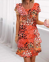 Jonna - Stilvolles Kleid Mit Leopard Enmuster Und Pailletten in Orange