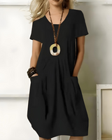 Eunate – Elegantes Baumwoll Kleid Mit Bauchweg-Effekt in Schwarz
