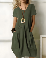 Eunate – Elegantes Baumwoll Kleid Mit Bauchweg-Effekt in Grün